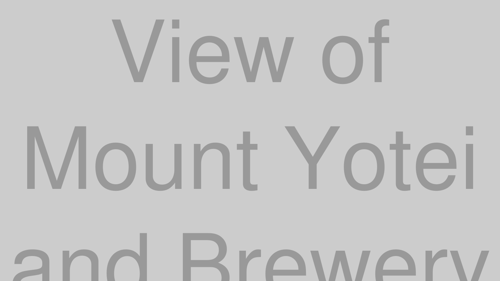 羊蹄山と酒蔵の風景